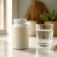 What to look for in a bladder health supplement — supplement bottle and glass of water on a kitchen counter — a simple buying guide